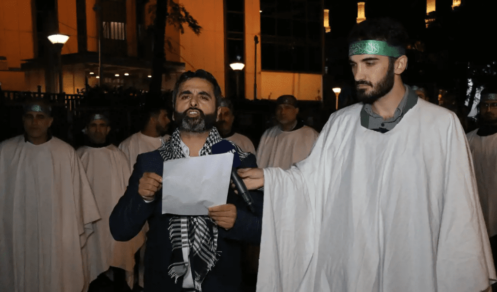 HÜDA PAR, işgalcilerin katliamlarını siyah çelenk ve kefenle protesto etti